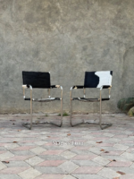 This cantilever chair features a classic-modern design with a bold, minimalist, and elegant char